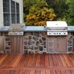 outdoor kitchen with stone