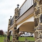 two story deck for a tan house