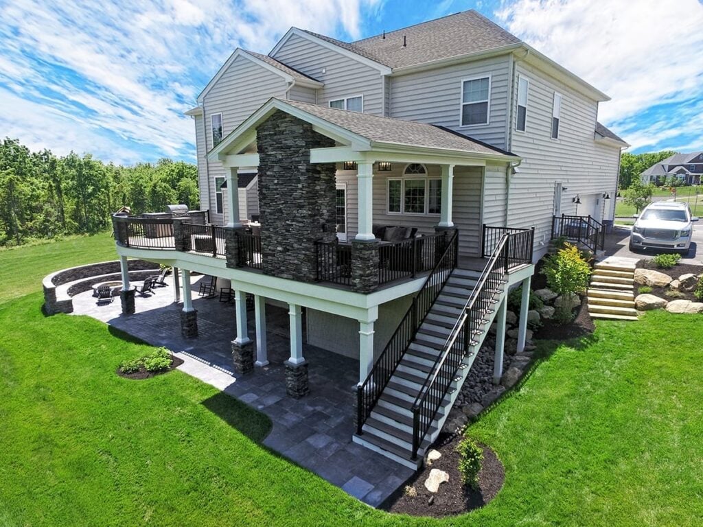 deck and porch with stone