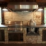 Mattice - TimberTech Porch with stone kitchen