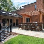 McElhaugh - flagstone patio and stairs with brick and fir pergola