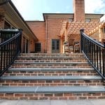 McElhaugh - flagstone staris with brick and curved railing