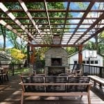 Broderick - Trex Deck and Pergola with stone wood-burning fireplace