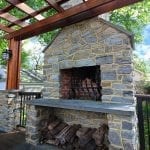 Broderick - Trex deck with stone wood-burning fireplace