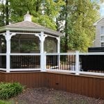 Cheung - timbertech deck with vertical decking and screened gazebo