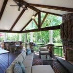 Polizzi - Trex Deck and porch with stonework fireplace