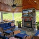 Kielinski - timbertech silver maple deck and porch with tv and fireplace