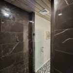 washroom for Keystone Custom Decks showroom, entrance to shower