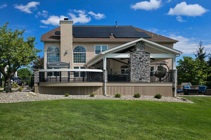 Curved TimberTech Deck with Vaulted Porch, Fireplace, and Granite Bar – Bethlehem, PA