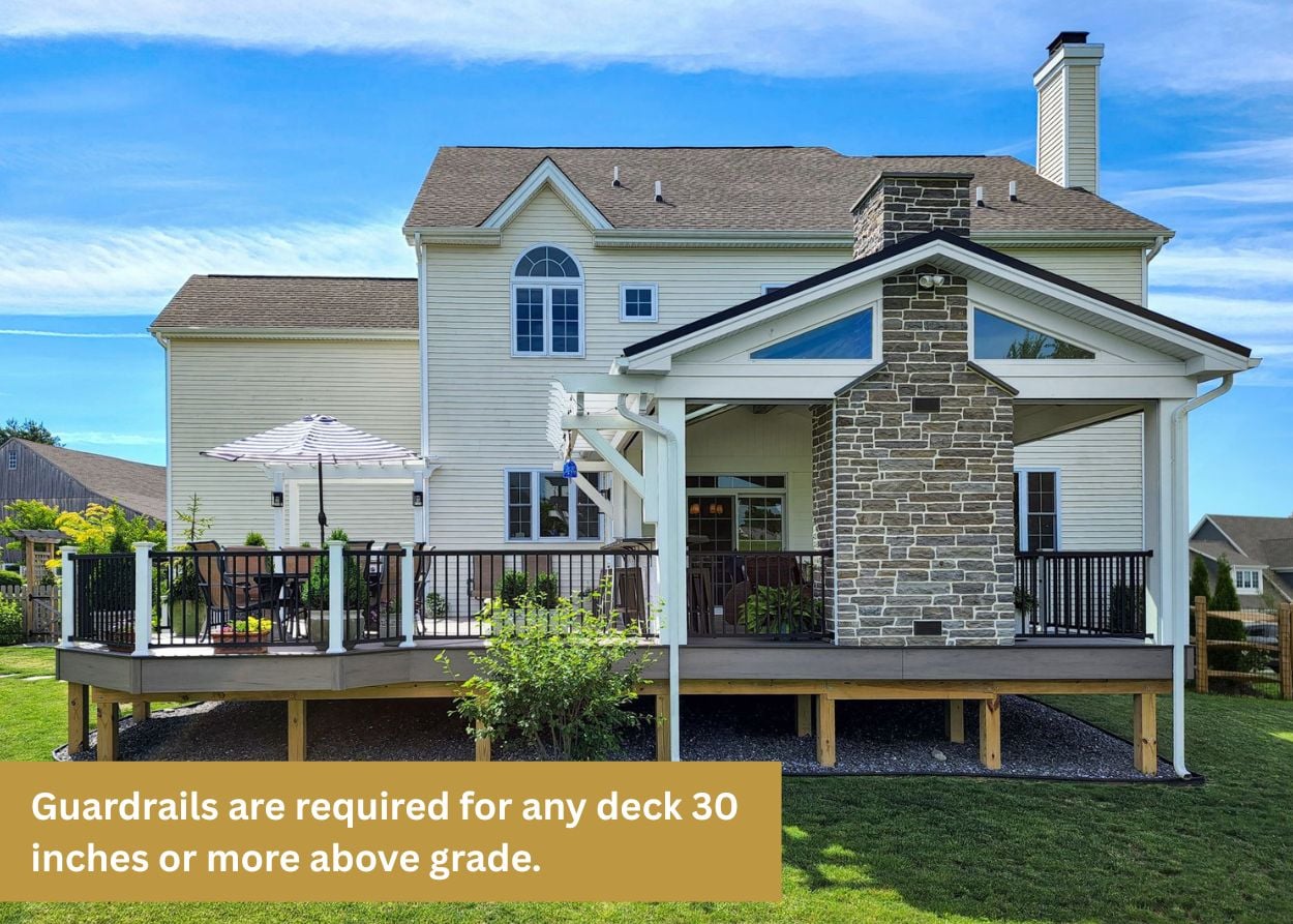 Two-story deck with stairs, railing system, and covered patio beneath in Hampden Township PA