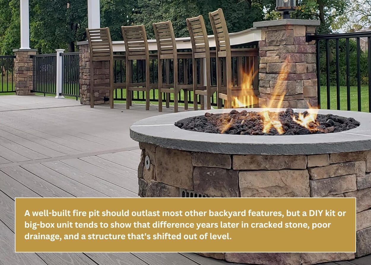 Stone wood-burning fire pit built into a spacious composite deck
