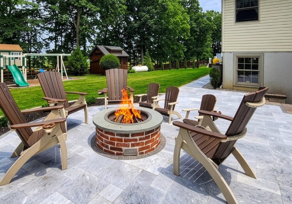 Planning a wood-burning fire pit? Get answers to 10 common questions about sizing, placement, permits, safety, maintenance, firewood, and more.